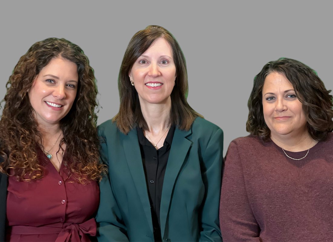 Homepage - Reid Insurance Agency Team Photo With Gray Background